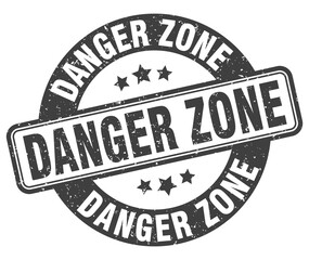 danger zone stamp. danger zone label. round grunge sign
