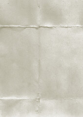 Blank folded gray paper sheet. Empty background crumpled paper texture