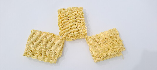 raw instant noodles on white background with copy space for text.	
