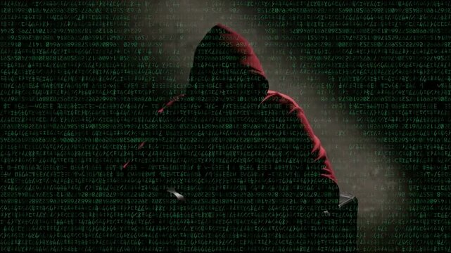 Anonymous computer hacker in a hood interview vintage VHS tape style video footage, mysterious man sitting on a chair and talking. Incognito hacker interview with no visible face footage