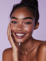 A radiant young woman with freckles, glowing skin, and a bright smile, posing joyfully against a soft lavender background