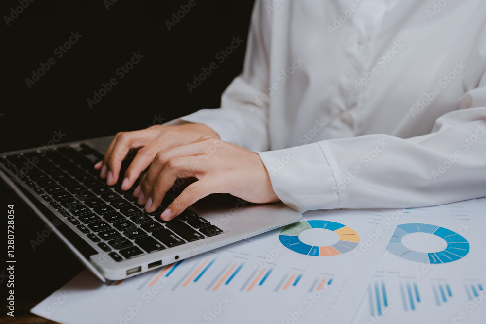 Poster professional business analysis with laptop and graphs on table