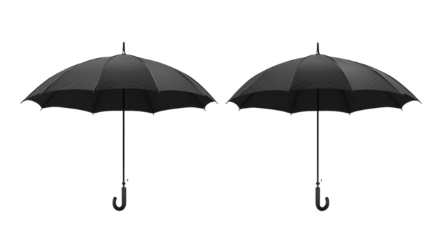 Dual black umbrellas creating a striking contrast with a minimalistic background