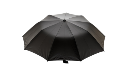 Protecting from the rain with a sleek black umbrella during a cloudy day