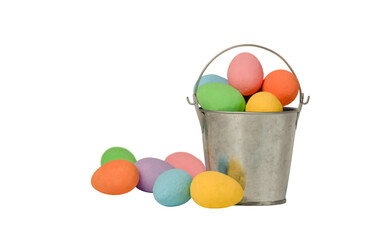 A bucket with Easter eggs on a white background. Creative greeting card. The concept of minimalism. Copy space for text