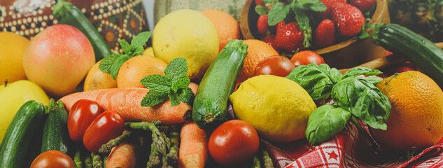 Naklejka na ściany i meble rustic composition of mixed fruits and vegetables viewed from above