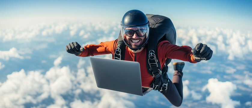 handsome free skydiver man with laptop smiling while using device; bright, cloudy sky background; concept of excited user of parachuting, great adventure, tour tourism, new technology; copy space