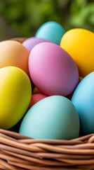 Assorted Pastel Eggs in Woven Basket with Soft Green Background