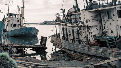 old broken down sunken ship in the port of Ukraine