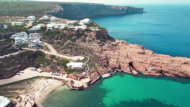 The landscapes and turquoise water of Cala Morell in Menorca, Balearic Islands