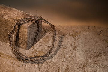 Crown of Thorns associated with the Passion of Jesus Christ. Fragment of a wooden cross symbol of...