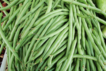 Fresh green beans (buncis) with a smooth surface and firm texture, showcasing their natural freshness and crisp quality. Commonly used in various dishes