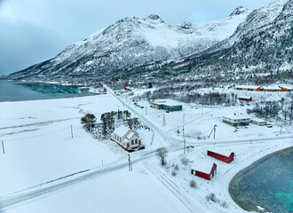 aerial winter landscape of the area around the fishing village of Stonglandseidet at the Tranoeyfjord on Senja Island in northern Norway, Scandinavia, Europe