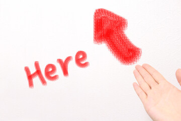 hand holding a red heart