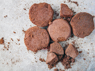 Top view of coffee grounds from espresso machine. coffee ground on gray background