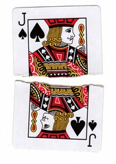 A vintage picture playing card made up of torn halves on a white background.