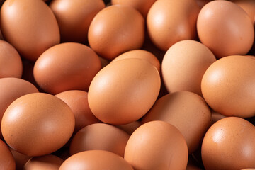 closeup of raw chicken eggs background