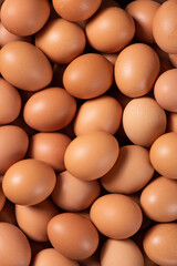 closeup of raw chicken eggs background