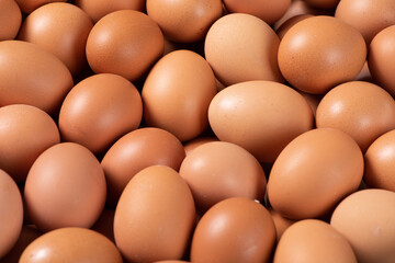 closeup of raw chicken eggs background