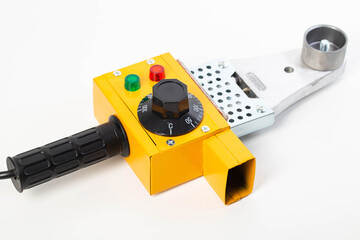 Electric soldering iron for welding polypropylene pipes on a white background, isolate. Plumbing...