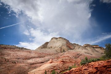 Majestic rocks under a colorful sunset sky.
