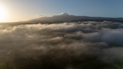Drone aerial view of Platanar Volcano above the clouds in Costa Rica