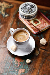 Cup of coffee on wooden background. Soft focus. Copy space