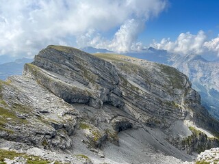 Alpine peaks Chli Hohmad (2492 m) and Gross Hohmad (2307 m) above the Tannensee lake (or Tannen lake) and in the Uri Alps mountain massif, Melchtal - Canton of Obwalden, Switzerland (Kanton Obwald)
