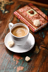 Cup of coffee on wooden background. Soft focus. Copy space