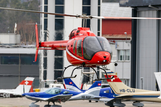 Bell 505 Jet Ranger X helicopter from Mountain Flyers arriving at Bern-Belp airport. Bern, Switzerland - Feb 27, 2024