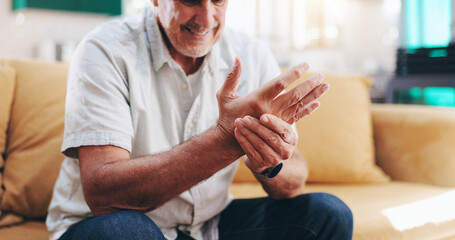 Senior man, hand pain and arthritis in home, orthopedic joint inflammation and check wrist damage....