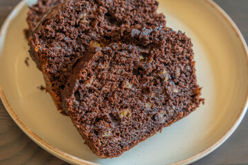 close-up of freshly sliced banana chocolate bread, showing its moist texture, rich chocolate swirls