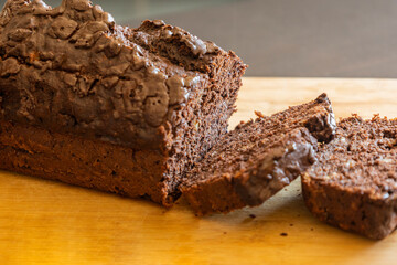 close-up of freshly sliced banana chocolate bread, showing its moist texture, rich chocolate swirls