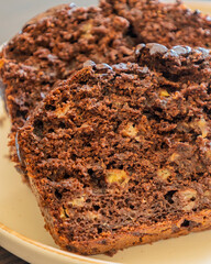 close-up of freshly sliced banana chocolate bread, showing its moist texture, rich chocolate swirls