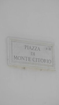 Vertical, Piazza di Monte Citorio where the Chamber of Deputies of the Italian government is located. In Rome