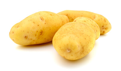 Three yellow fresh potatoes