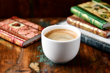 Cup of coffee on wooden background. Soft focus. Copy space.	