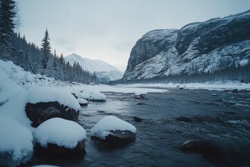 Obraz premium A frozen river in a valley, surrounded by snow-covered mountains and pine trees. The image captures the serene winter landscape.