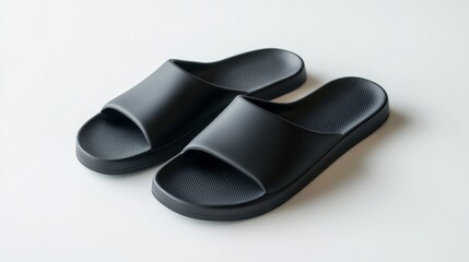 Minimalist black slide sandals on white background