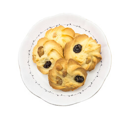 Plate of cookies with dark raisins on a white dish isolated transparent background