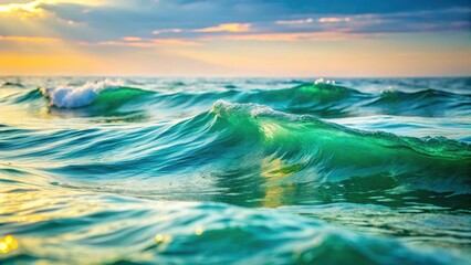 Obraz premium Dreamy ocean waves in soft focus with hues of blue and green, subtle ripples and foam on the surface , green, serene , green, serene