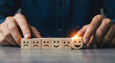 Customer satisfaction feedback survey concept. Person selects yellow smile face block from row of colorful blocks various facial expressions, feedback rating, different levels of customer satisfaction