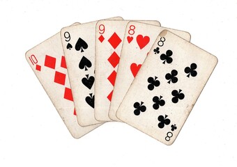A poker hand of vintage playing cards on a white background.
