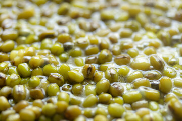 Boiled mung bean in the water. Close-up