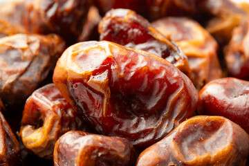 Heap of dried dates fruit. Close-up
