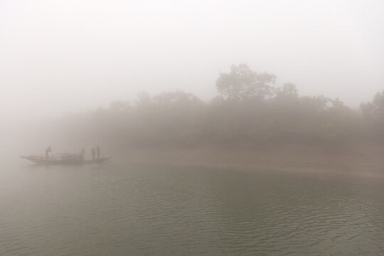 SUNDARBAN, INDIA-JANUARY 05: Fishermen fishing at Sundarban Tiger Reserve, West Bengal, India on January 05, 2025