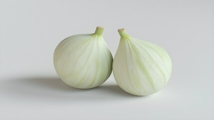 Obraz premium Fresh Green Figs Isolated on a White Background in Close-Up View