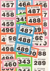 Strips of colourful vintage raffle tickets.