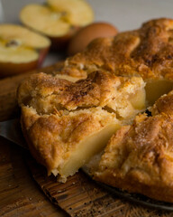 Delicious cinnamon cake with fresh apple pieces. Traditional German recipe.