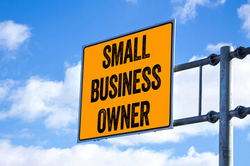 Small business owner message written on billboard. Conceptual small business owner symbol. Copy space.